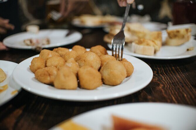 Tapas Tour Madrid Experience - Plaza Mayor: finishing in the old-market heart