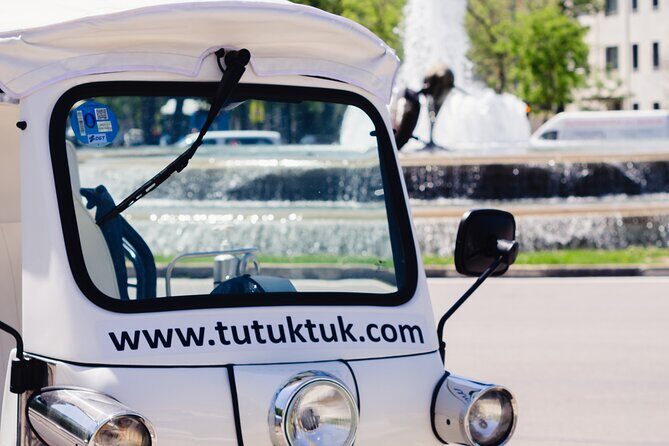 Tour of Historic and Modern Madrid with a guide in a yellow tuk tuk - Football stops that make fans smile: Real Madrid and Atlético de Madrid