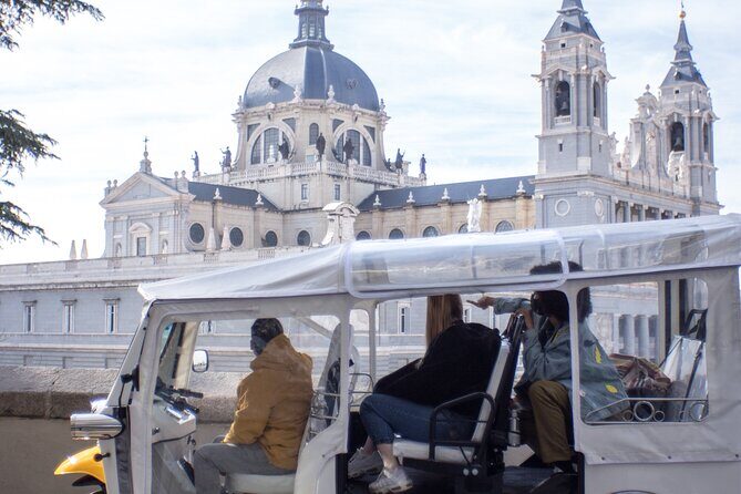 Tour of Historic and Modern Madrid with a guide in a yellow tuk tuk - The beautiful church and the park breaks: a breather in the route