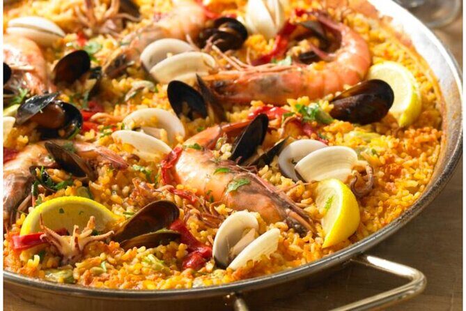 Traditional Paella & Sangría Workshop & Spanish Meal in Madrid - Paella cooking lesson in a traditional pan